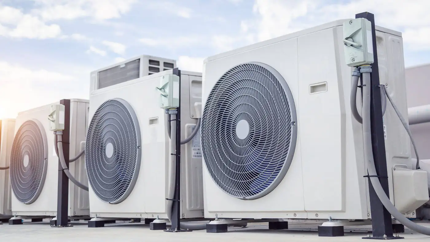 Commercial air conditioning condensers in Bristol Row of commercial air conditioning outdoor units on a rooftop in Bristol
